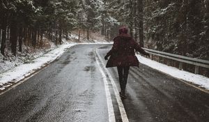 Preview wallpaper road, silhouette, trees, turn, snow, asphalt, wet