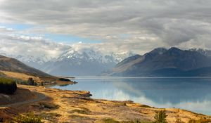 Preview wallpaper road, sky, lake, hill