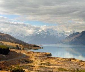Preview wallpaper road, sky, lake, hill
