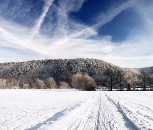 Preview wallpaper road, sky, white, country, frost, traces, trees, ease