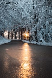 Preview wallpaper road, snow, sun, winter, nature