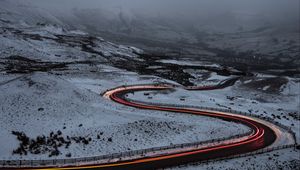 Preview wallpaper road, snow, turns, long exposure, fog