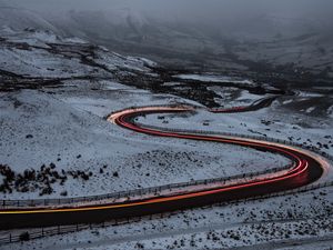 Preview wallpaper road, snow, turns, long exposure, fog