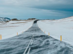 Preview wallpaper road, snow, winter, marking, direction