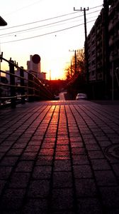 Preview wallpaper road, street, sunset, buildings