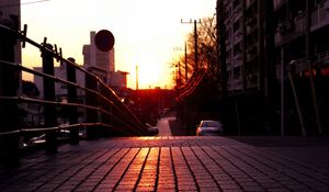 Preview wallpaper road, street, sunset, buildings