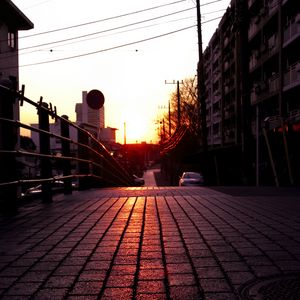 Preview wallpaper road, street, sunset, buildings