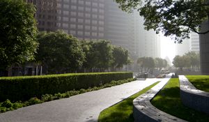 Preview wallpaper road, street, trees, buildings, shadows