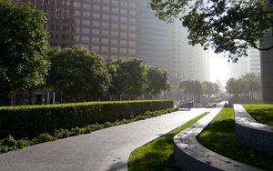 Preview wallpaper road, street, trees, buildings, shadows