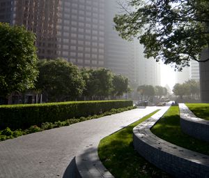 Preview wallpaper road, street, trees, buildings, shadows