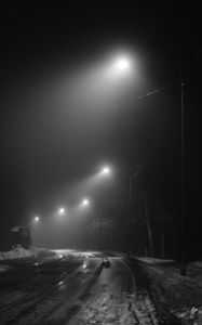 Preview wallpaper road, streetlights, night, snow, bw, dark