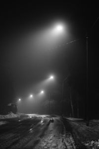 Preview wallpaper road, streetlights, night, snow, bw, dark