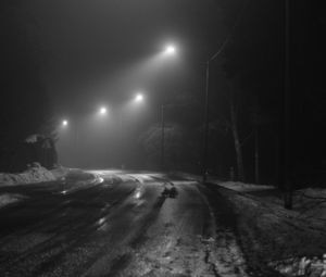 Preview wallpaper road, streetlights, night, snow, bw, dark