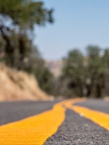 Preview wallpaper road, stripes, asphalt, yellow, blur