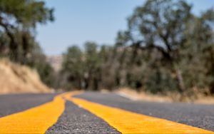 Preview wallpaper road, stripes, asphalt, yellow, blur