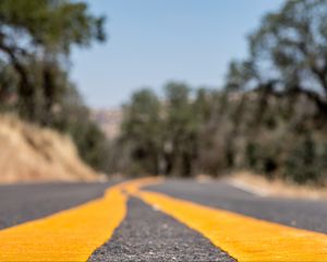 Preview wallpaper road, stripes, asphalt, yellow, blur