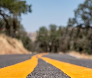 Preview wallpaper road, stripes, asphalt, yellow, blur