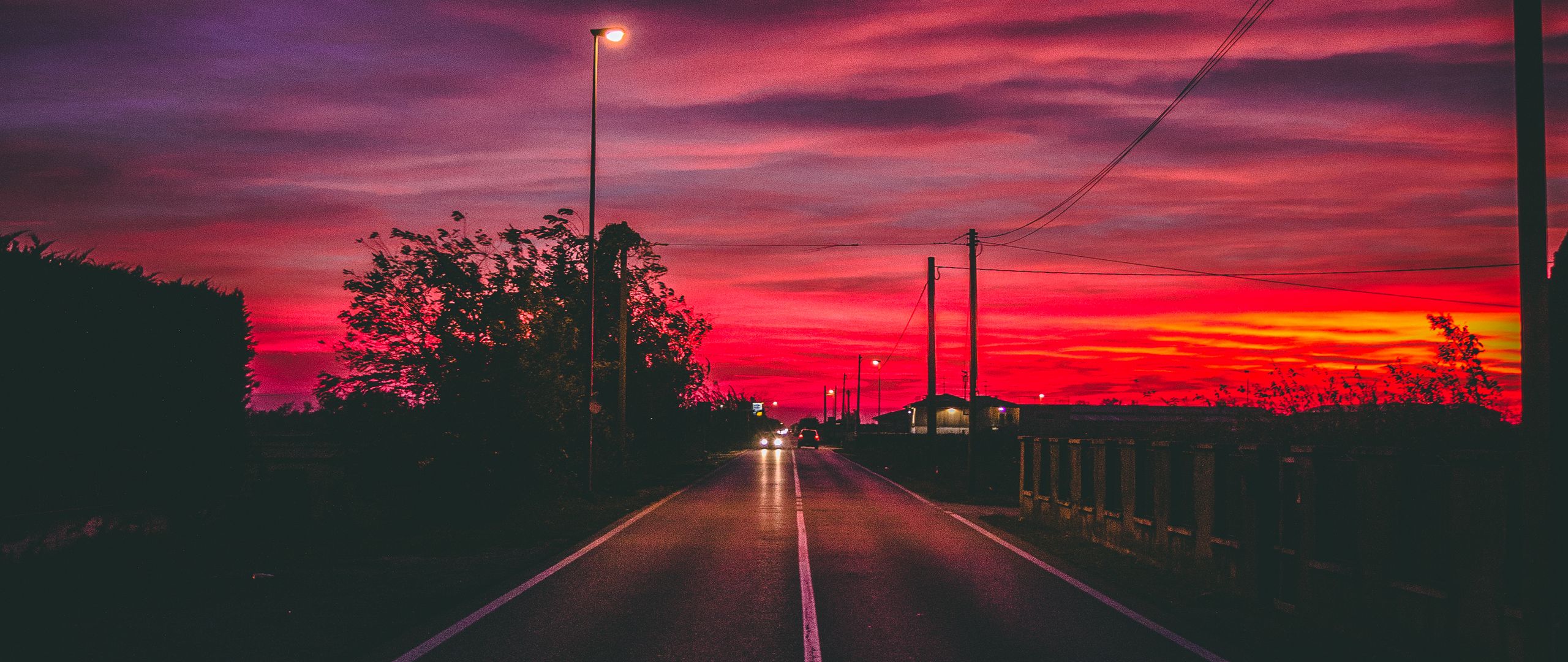 2560x1080 Wallpaper road, sunset, horizon, marking