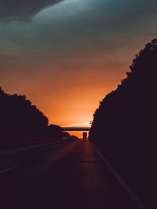 Preview wallpaper road, sunset, movement, clouds, twilight
