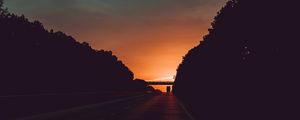 Preview wallpaper road, sunset, movement, clouds, twilight