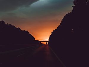 Preview wallpaper road, sunset, movement, clouds, twilight