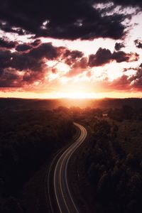 Preview wallpaper road, sunset, sky, trees, forest, aerial view