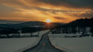 Preview wallpaper road, sunset, snow, winter, nature
