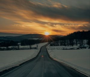 Preview wallpaper road, sunset, snow, winter, nature
