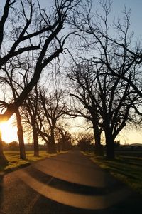Preview wallpaper road, sunset, trees, asphalt