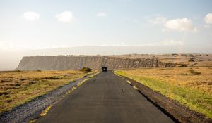 Preview wallpaper road, suv, field, hill