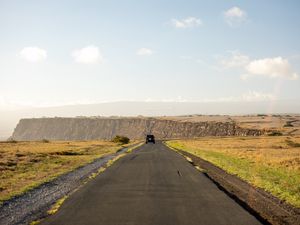 Preview wallpaper road, suv, field, hill