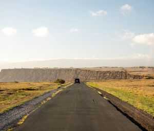 Preview wallpaper road, suv, field, hill