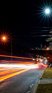 Preview wallpaper road, tail lights, lights, glow, buildings, night, long expourse