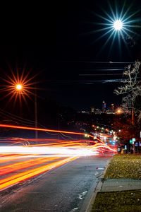 Preview wallpaper road, tail lights, lights, glow, buildings, night, long expourse