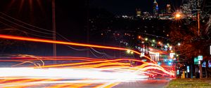 Preview wallpaper road, tail lights, lights, glow, buildings, night, long expourse