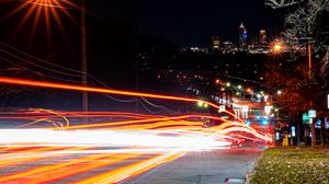 Preview wallpaper road, tail lights, lights, glow, buildings, night, long expourse