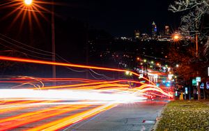 Preview wallpaper road, tail lights, lights, glow, buildings, night, long expourse