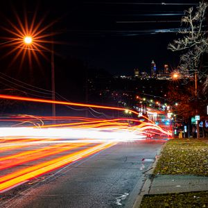 Preview wallpaper road, tail lights, lights, glow, buildings, night, long expourse