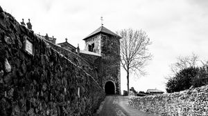 Preview wallpaper road, tower, wall, black and white