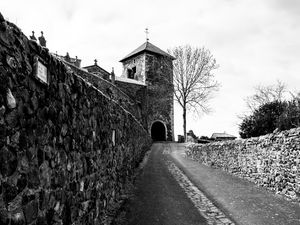 Preview wallpaper road, tower, wall, black and white