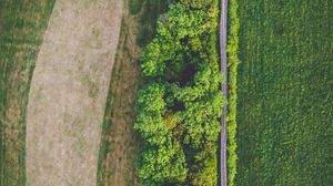 Preview wallpaper road, trees, aerial view, field