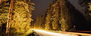 Preview wallpaper road, trees, forest, stars, night