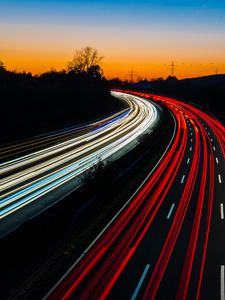 Preview wallpaper road, turn, backlight, movement, evening, twilight, long exposure