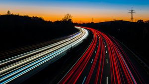 Preview wallpaper road, turn, backlight, movement, evening, twilight, long exposure