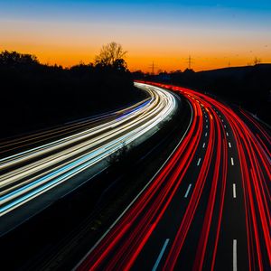 Preview wallpaper road, turn, backlight, movement, evening, twilight, long exposure