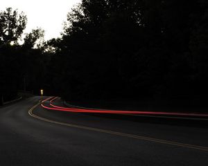 Preview wallpaper road, turn, dark, asphalt, trees