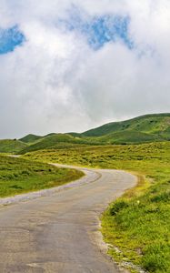 Preview wallpaper road, turn, field, grass, hills, nature