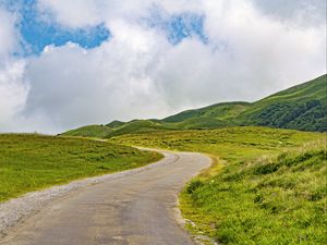 Preview wallpaper road, turn, field, grass, hills, nature