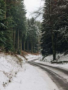 Preview wallpaper road, turn, forest, trees, snow, winter