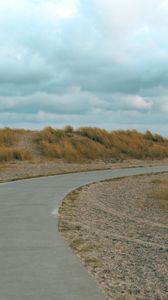 Preview wallpaper road, turn, grass, hill, roadside